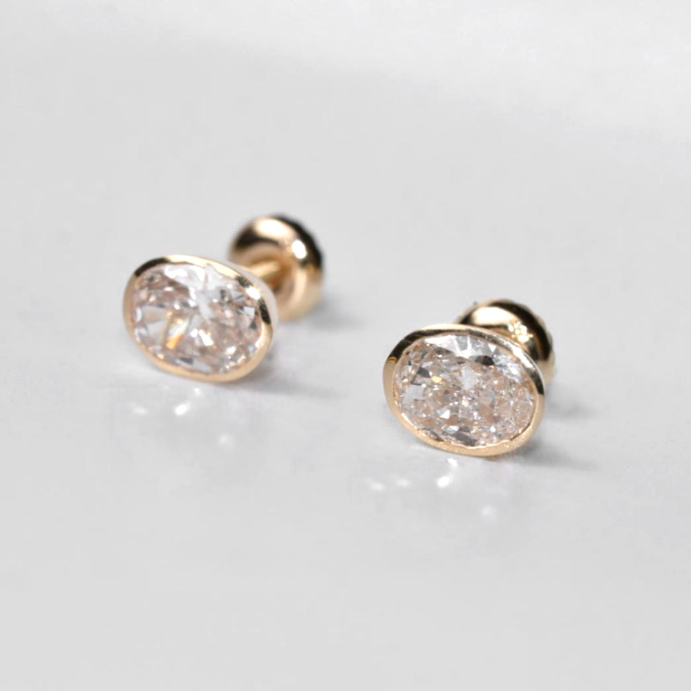 Oval Cut Lab-Grown Diamond Bezel Stud EarringsOval Cut Lab-Grown Diamond Bezel Stud Earrings