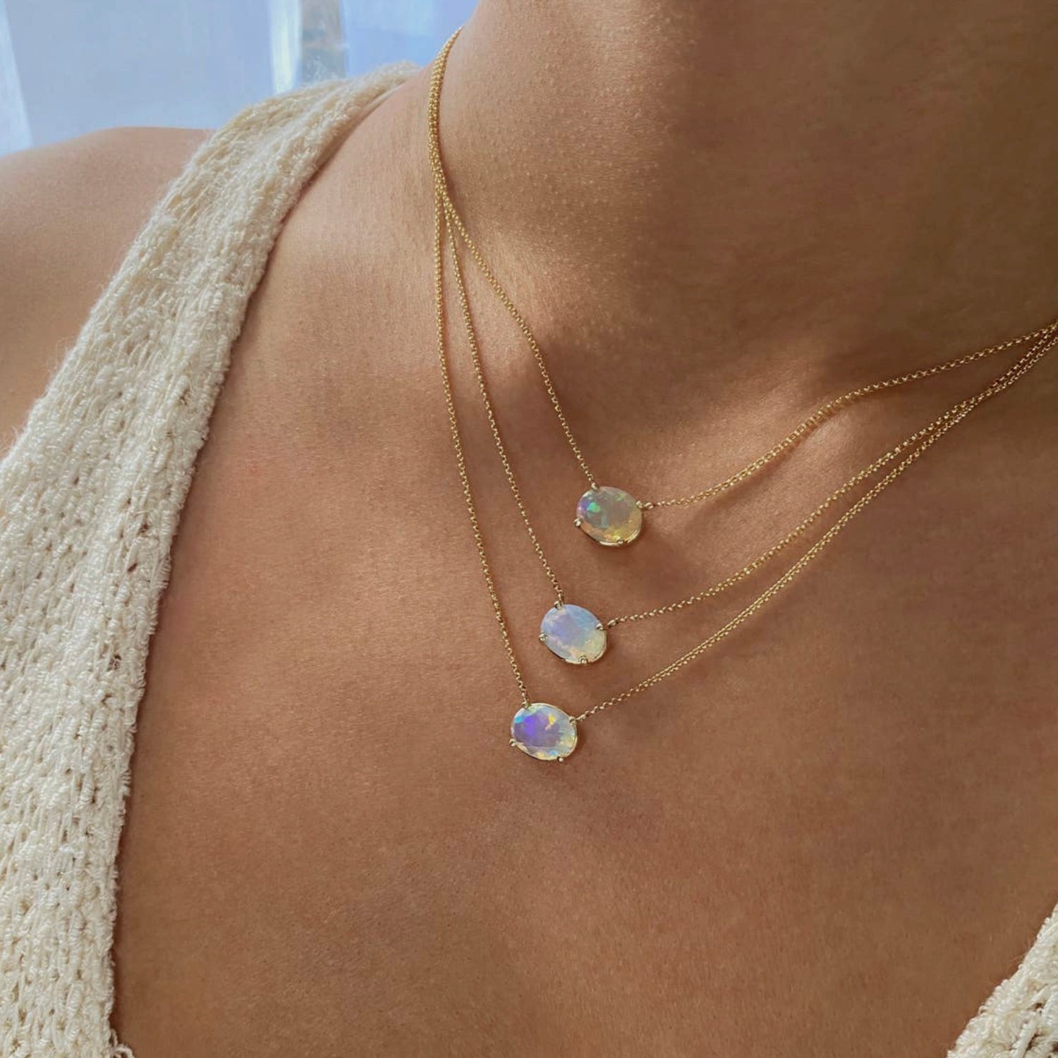 Oval Cut White Opal East-West Solitaire Necklace on a Model